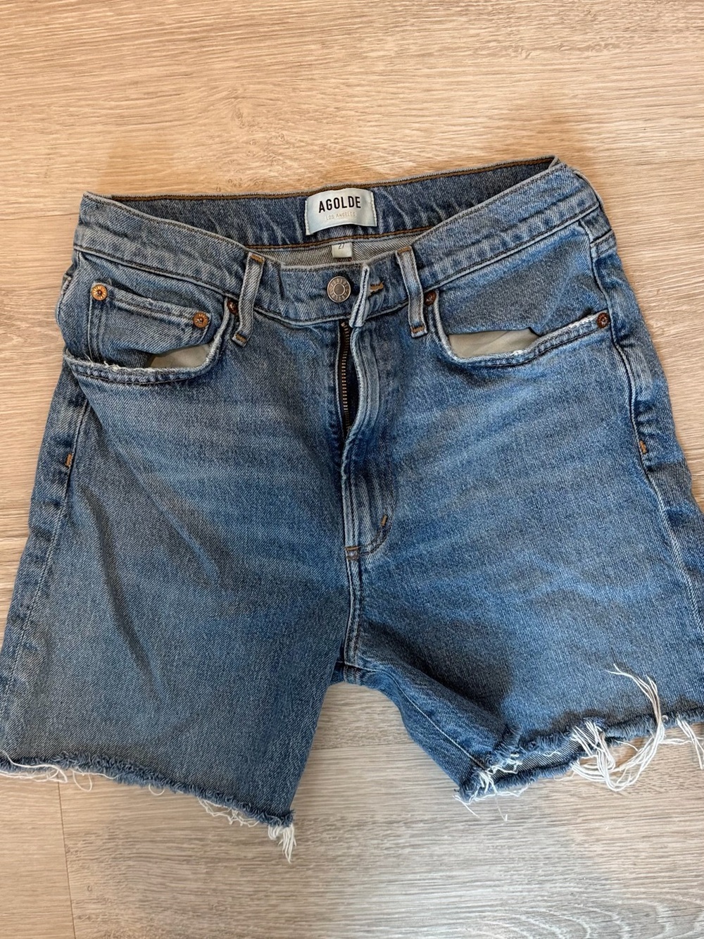 Agolde Medium Blue Distressed Denim Cutoff Shorts